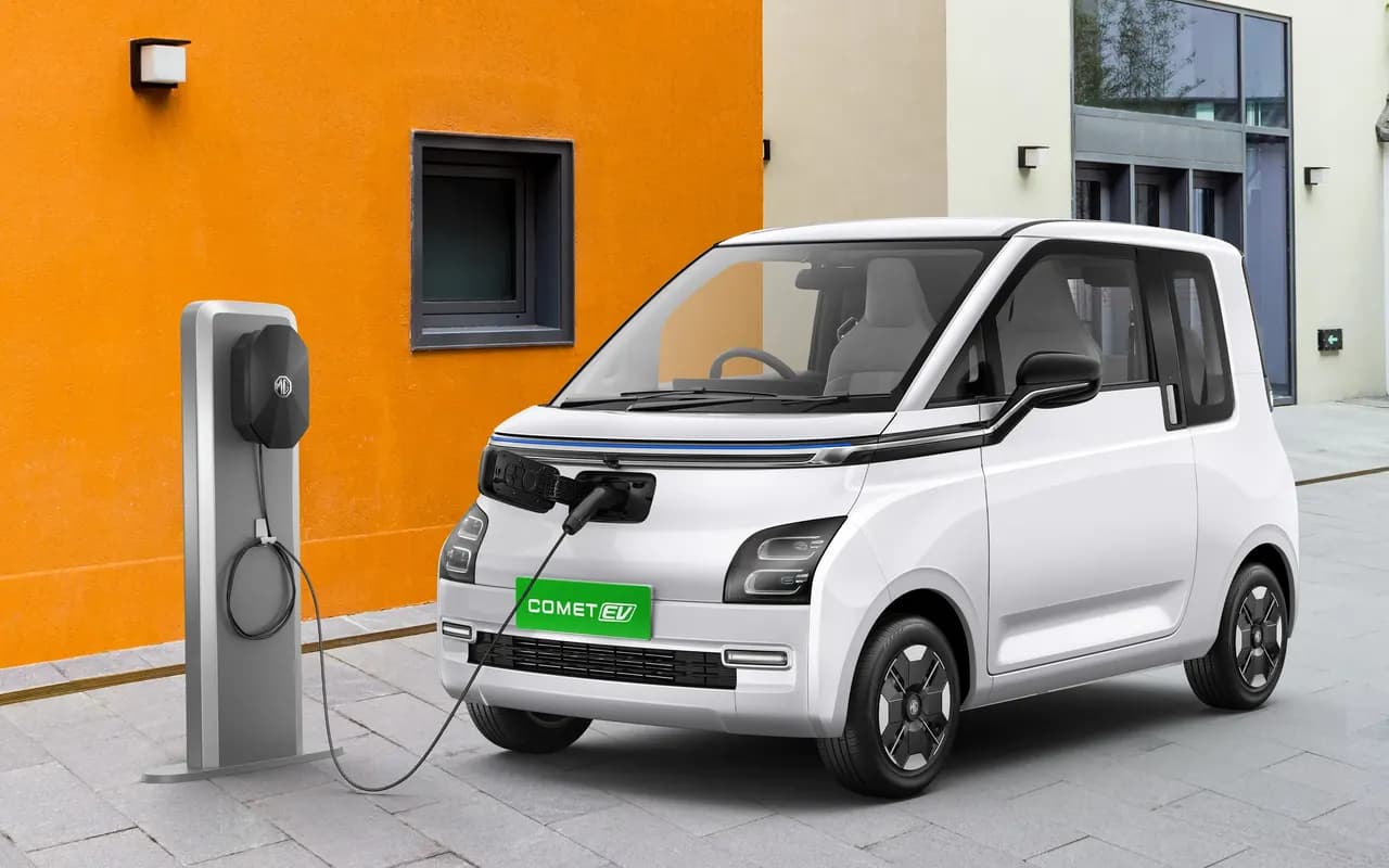 An MG Comet EV plugged into an AC charging post